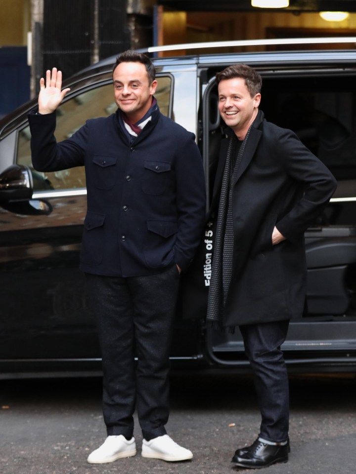 Ant McPartlin and Declan Donnelly wave at waiting fans