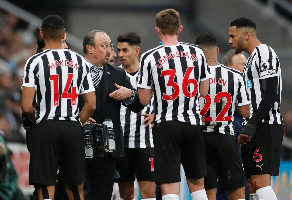  Benitez instructs his players as they aim for a vital win