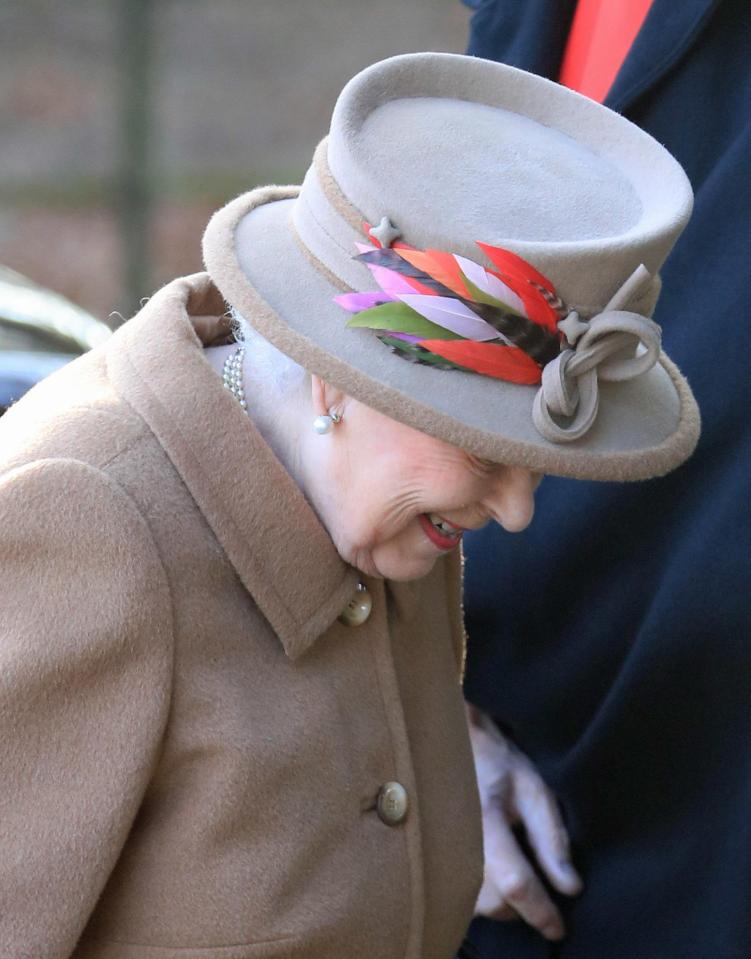  A crowd of well-wishers who had gathered near the church were treated to a smile