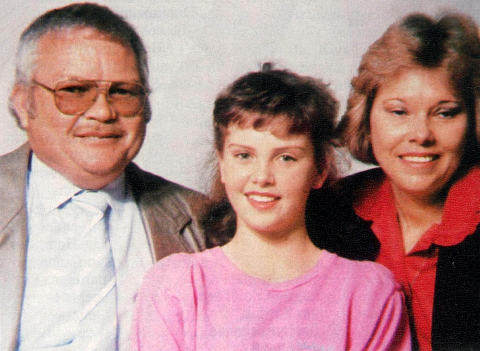  Charlize Theron as a child with her mother Gerda and father Charles