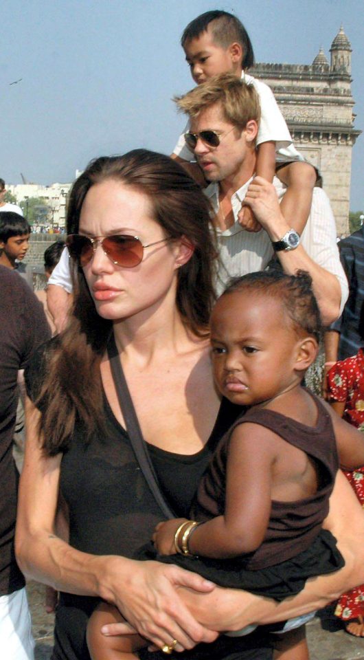  Brad and Angelina, seen here with some of their six children, divorced after a row on a plane