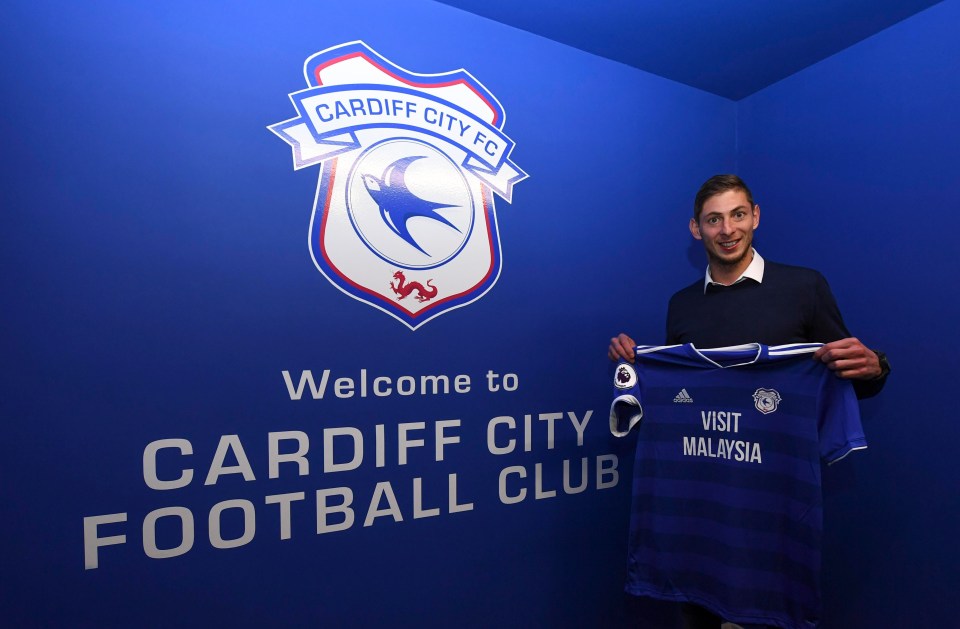 Emiliano Sala poses with his Cardiff shirt after signing for the club over the weekend