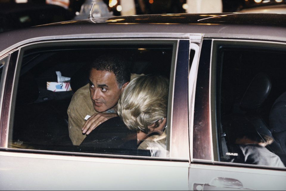  Dodi Fayed checks if the coast is clear on arriving with Princess Diana at the Ritz Hotel in Paris in a chauffeured car on the night of August 30, 1997