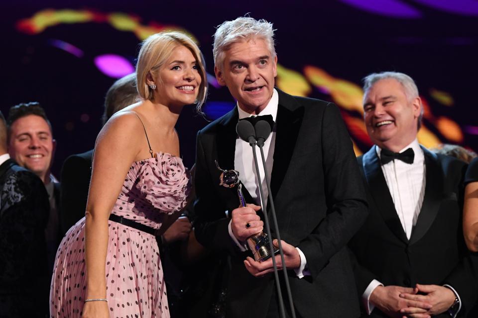  Holly and Phil beamed with joy as they collected the award instead