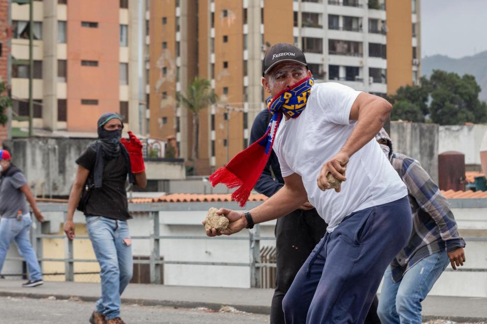  Violent protests erupted in Venezuela after thousands took to the streets in a bid to oust President Nicolas Maduro