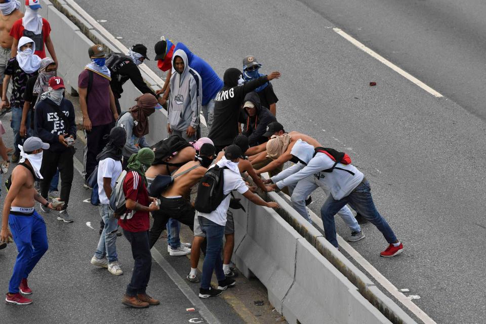  Protesters occupy a freeway during a protest against the government