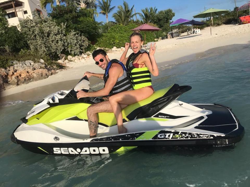  Giovanni Pernice and Ashley Roberts look on top of the world as they pose for a photo on a jet-ski