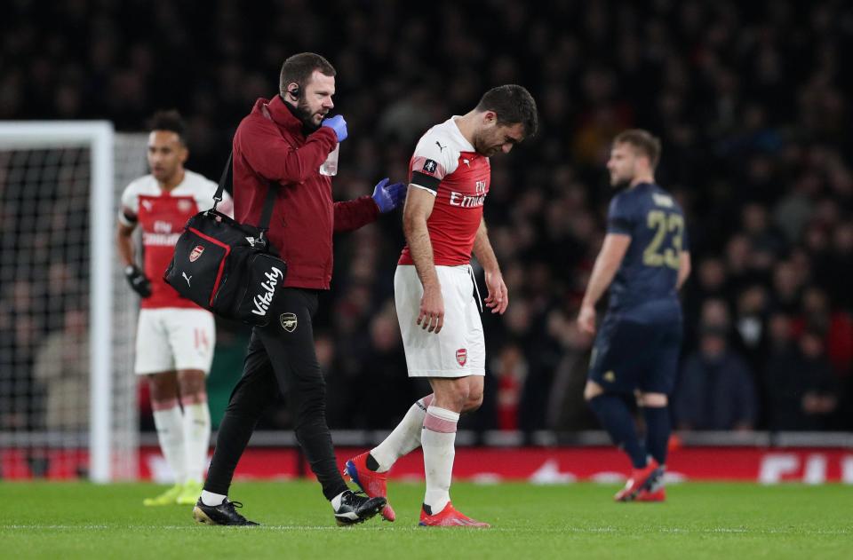  Sokratis limped off for Arsenal just 20 minutes into their clash with Man Utd