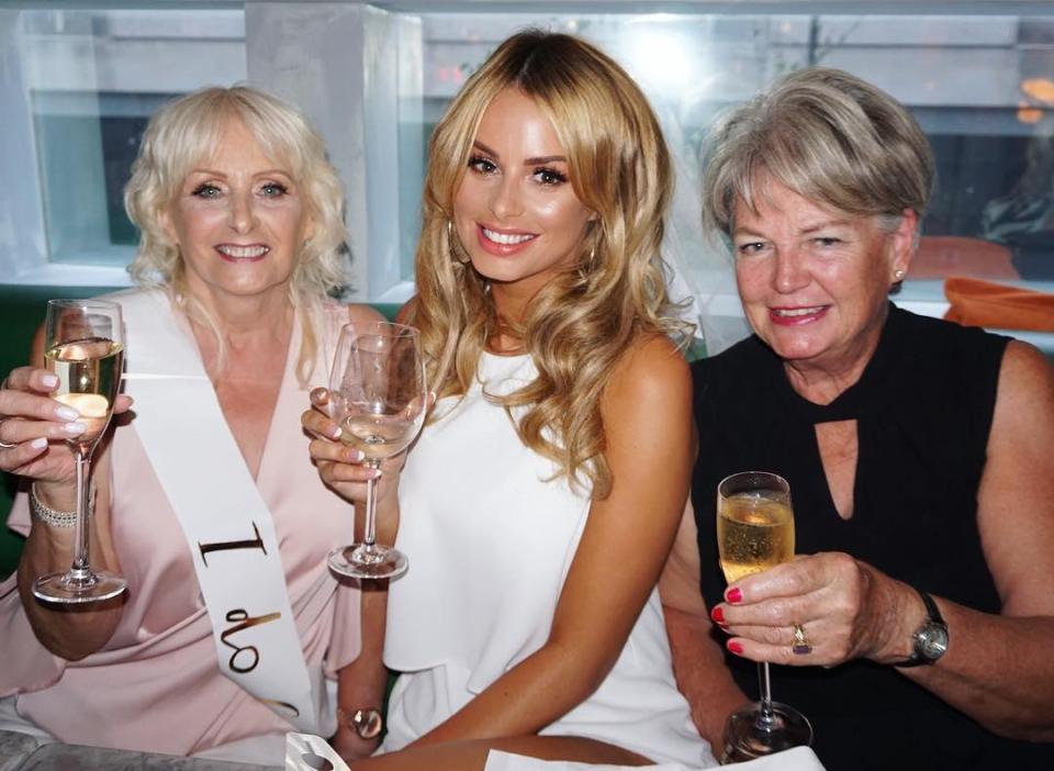  Rhian doesn't hold back on the alcohol and loves a glass of white wine- pictured with her mum and mother-in-law