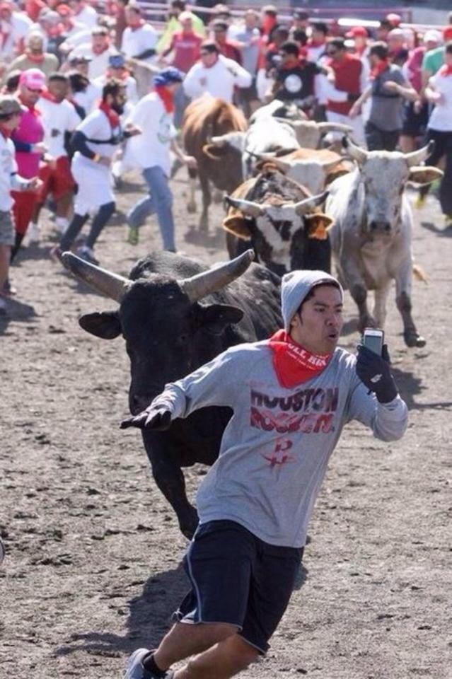  This man risked his life being chased by a bull to get this epic shot