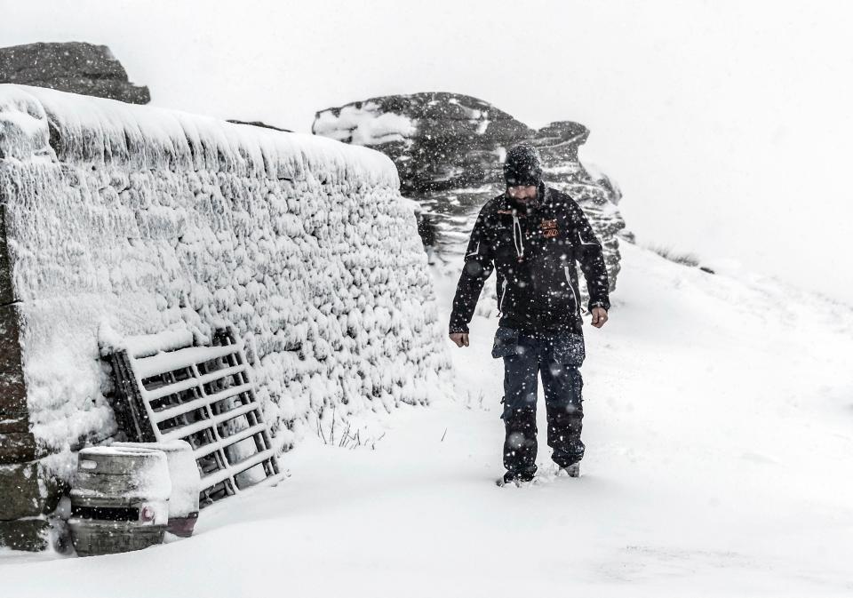  A man walks in snowy conditions in North Yorkshire