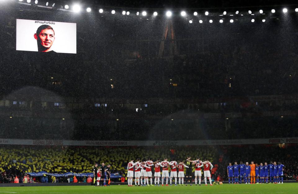  Cardiff and Arsenal stars showed their respect as they held a minute's silence