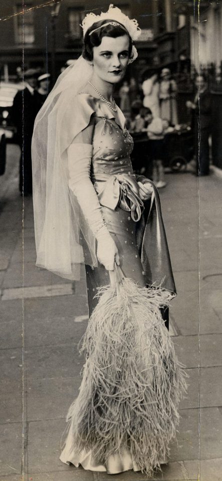  Margaret, the future Duchess of Argyll, pictured leaving home to be presented at court in 1934