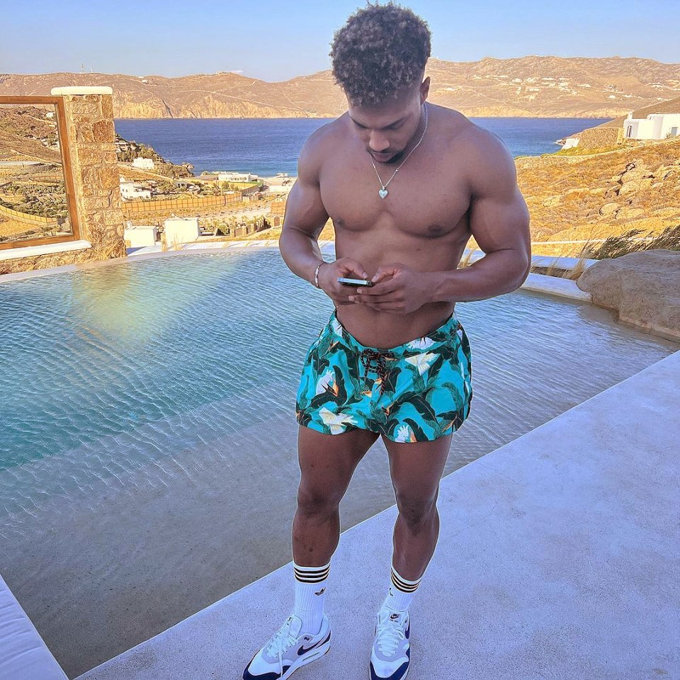 Adama Traore showed off his bulky physique on holiday