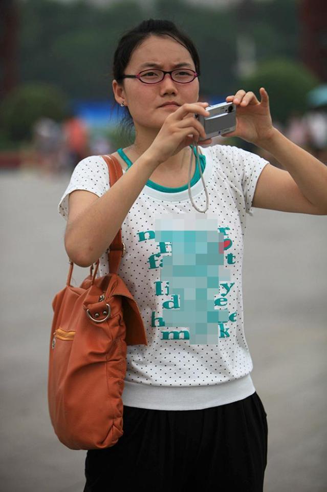  This woman somehow managed to wear a T-shirt consisting of the world discrimination words in the book