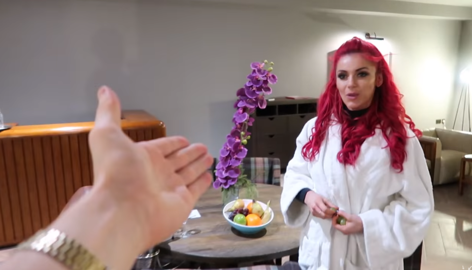  Dianne had already put on the hotel's robes for the video