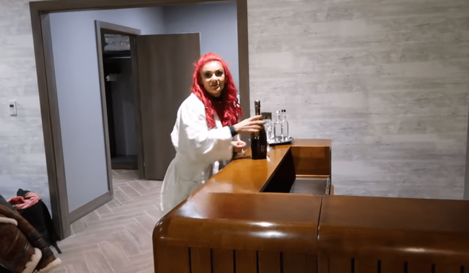 Dianne posed with the bottle of prosecco in the video