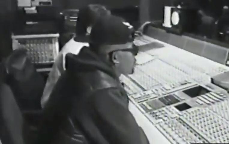  R Kelly pictured producing Aaliyah as she records in a studio in 1994