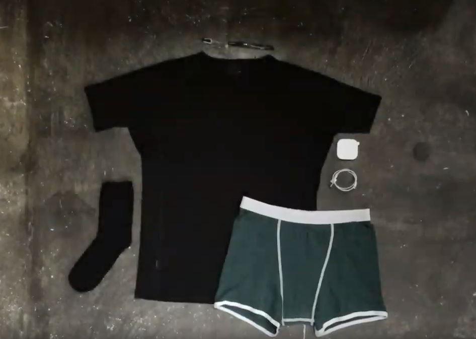  The videos shows how to fold a T-shirt, underwear, socks, toothbrush and charger into a small roll