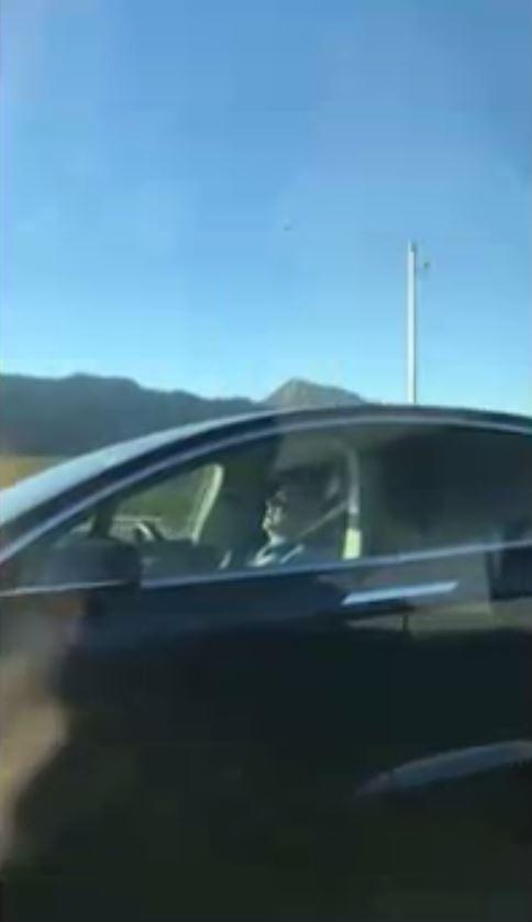 A man was filmed sleeping in his car while driving a Tesla on autopilot