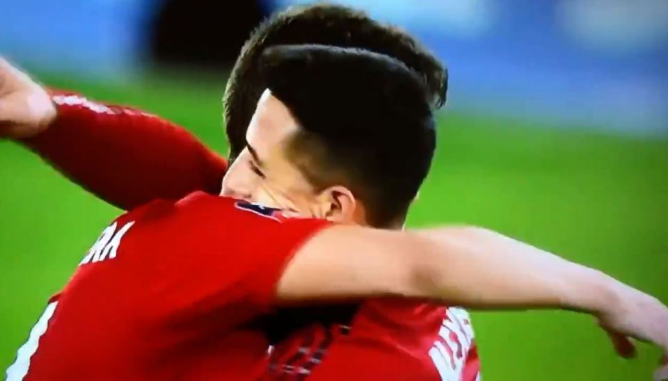  The pair then hugged on the pitch at Stamford Bridge