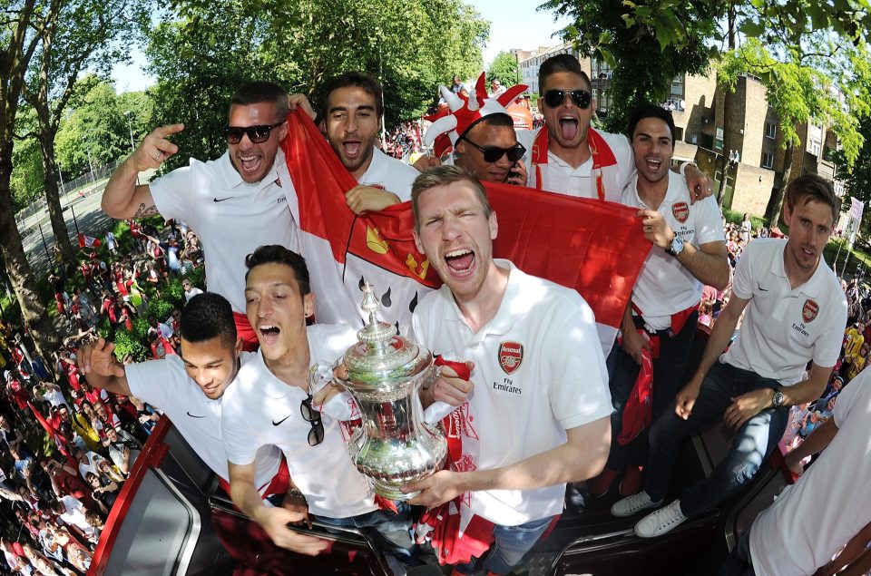  The pair (bottom left) celebrated a vital FA Cup final win in 2014