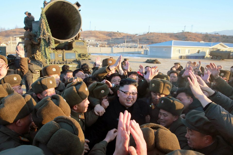  Kim Jong Un celebrates the test launch of the missile at the Iha-ri site