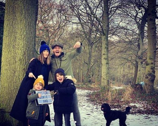  Actress Charley, 30, shared a picture of the couple with their sons Buster, eight, and Bowie, three, on a family walk in the woods