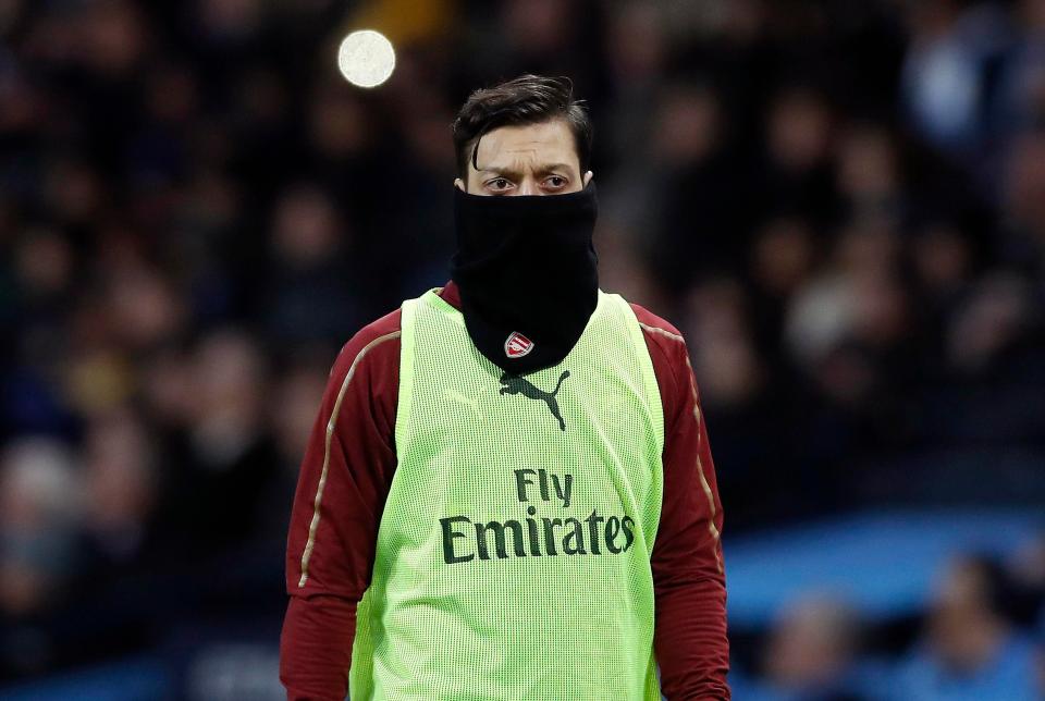  Arsenal are under pressure to sell £350,000-a-week Mesut Ozil