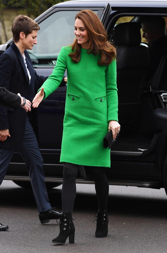 Fans spotted an angry face in Kate Middleton's designer dress yesterday