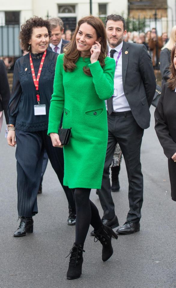  In one snap, it looked as though Kate's frock was gobbling up her clutch bag