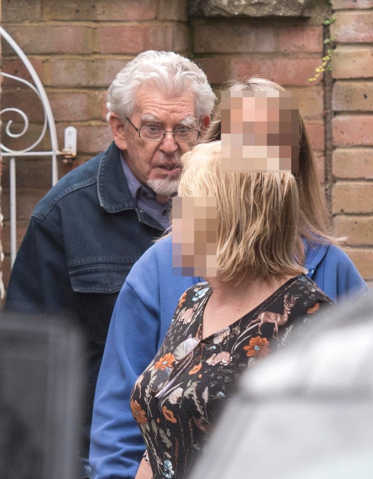 Rolf Harris, pictured today outside his home in Bray, Maidenhead, after it emerged he walked onto school grounds and waved at pupils