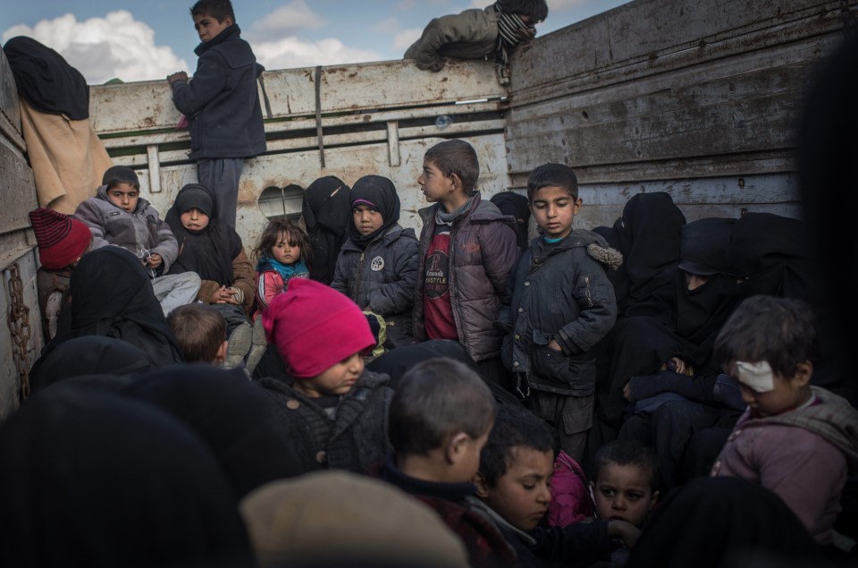 Kids being transferred to a camp by the Syrian Democratic Forces (SDF)