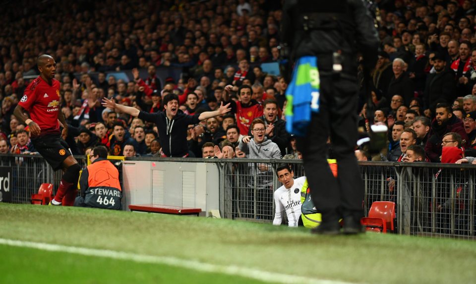  Angel Di Maria lays stricken on the ground following the challenge