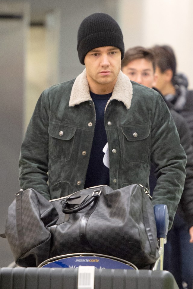  Liam Payne looked downcast as he arrived in New York today