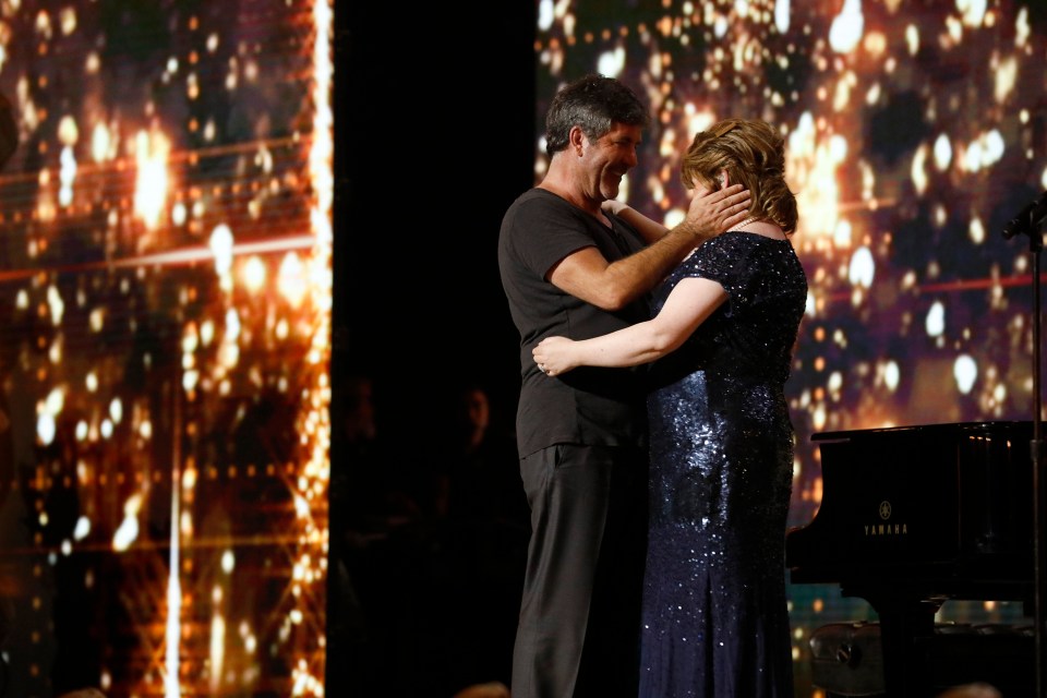 Simon Cowell celebrates with Susan Boyle on US TV