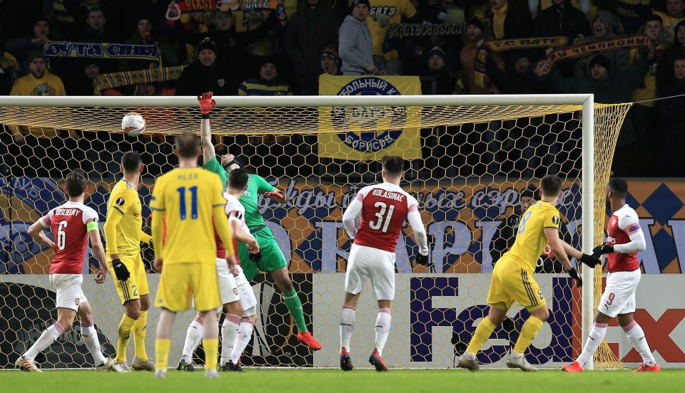  Stanislav Dragun darts in for a moment he might never forget - as he nods the opener against Arsenal