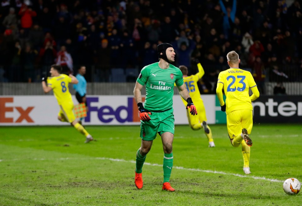  Arsenal goalkeeper Petr Cech reacts after Stanislav Dragun scores the winner for minnows BATE Borisov