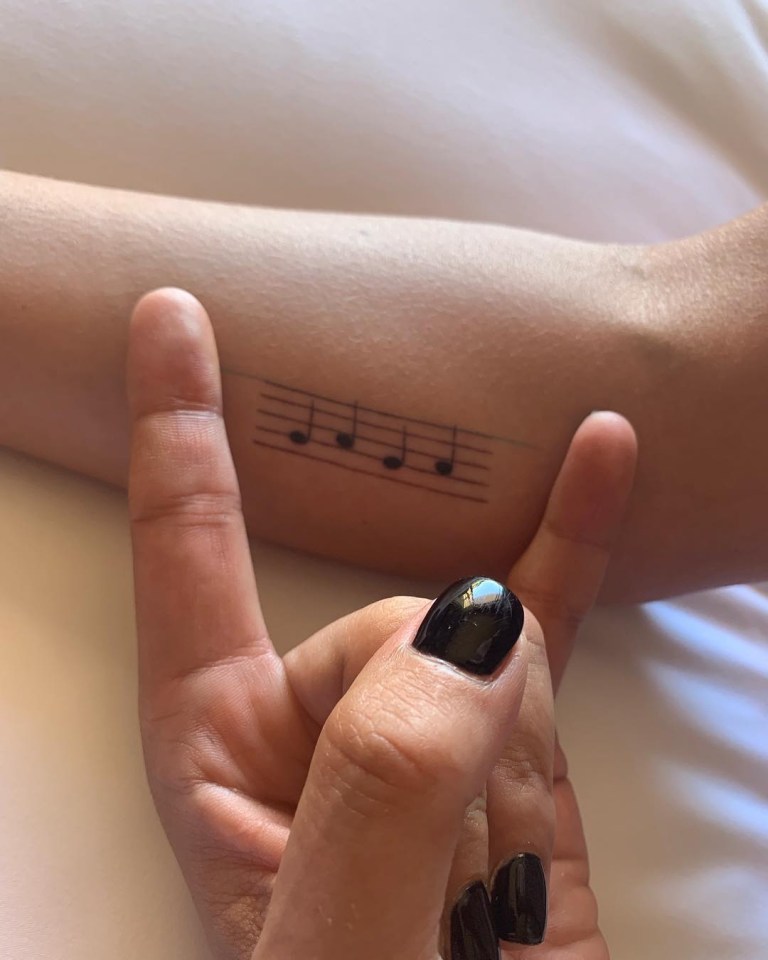  She also got her music note tattoo fixed