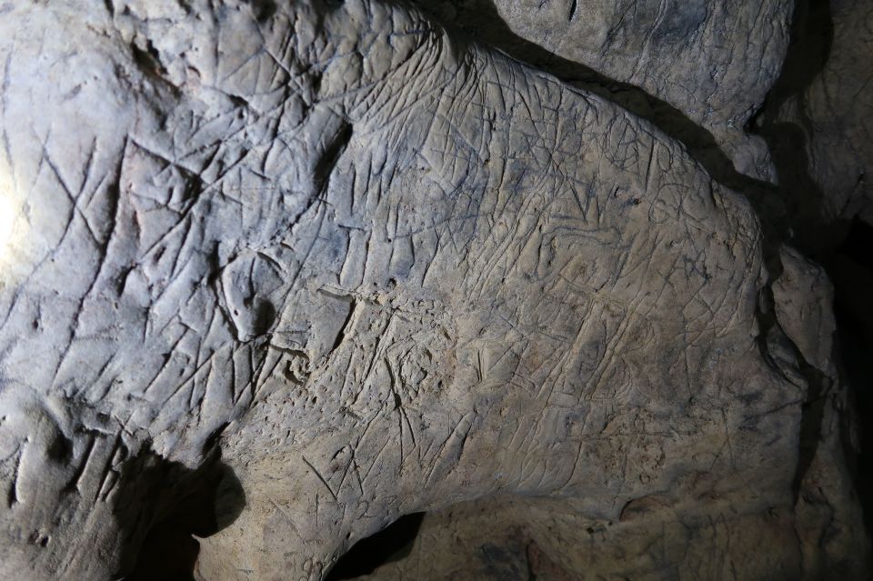  The walls and ceilings of the caves at Creswell Crags are covered in scrawls used to capture evil spirits rising from the underworld below