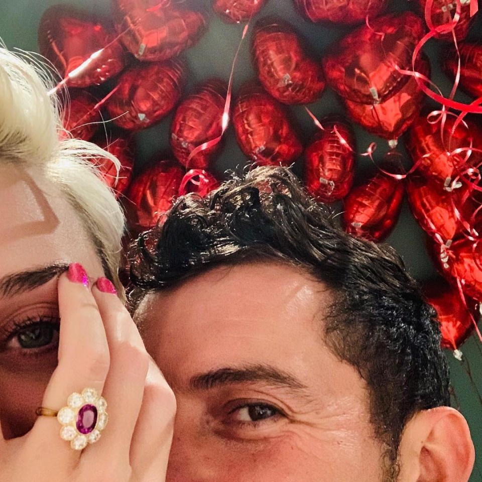 Katy took to Instagram to confirm their engagement as she showed off the unusual ring