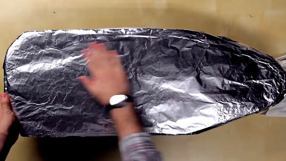  Placing a layer of tin foil beneath your ironing board cover speeds up ironing