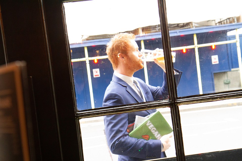  The lookalike Prince Harry downs a drink while he's not with his pregnant wife