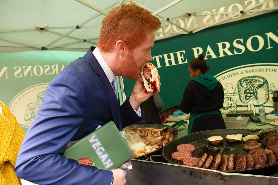  The collection includes a photo of 'Prince Harry' tucking into a burger while holding a book on veganism