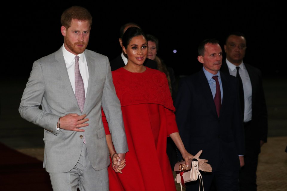  The royal couple held hands as they were escorted from the airport