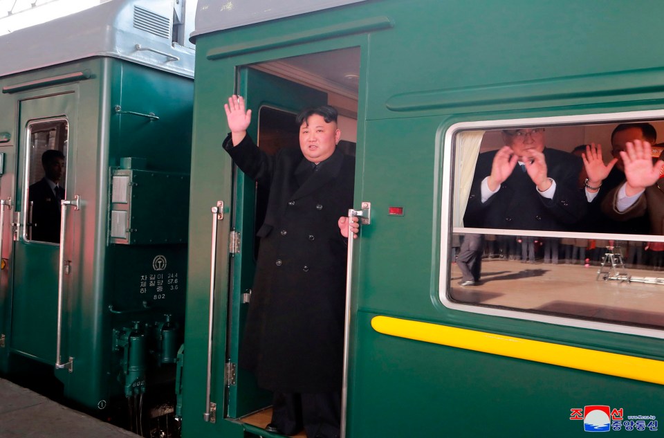  Kim Jong-un waves from his bulletproof luxury train carriage ahead of the epic 3,000-mile journey to meet Donald Trump