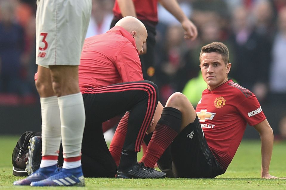  Ander Herrera joins Man Utd's long injury list as he was hauled off the pitch just after 20 minutes against Liverpool