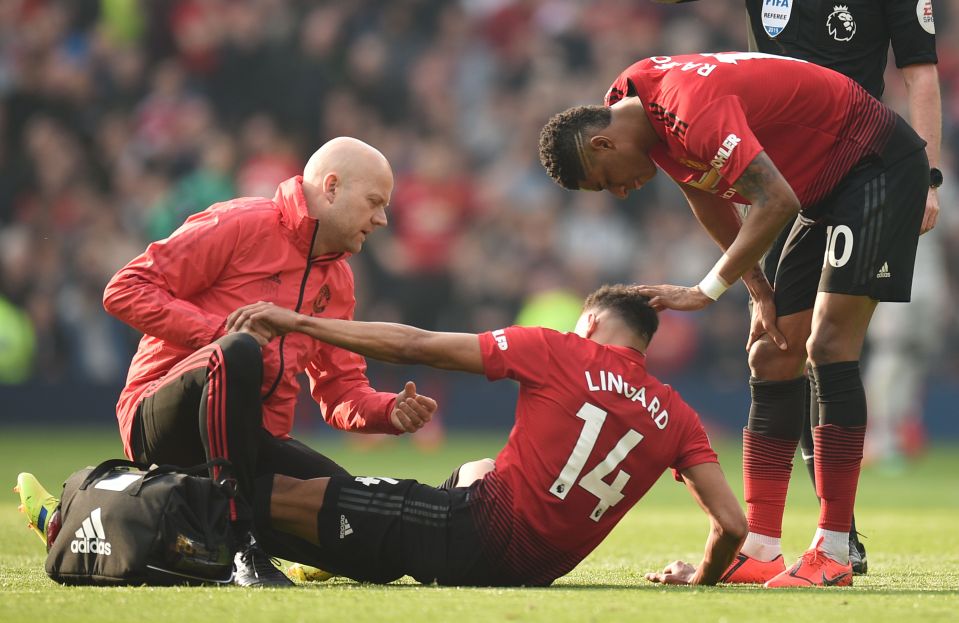  Lingard joined their team-mates as he limped off the pitch after being tripped by Liverpool goalkeeper Alisson before half-time