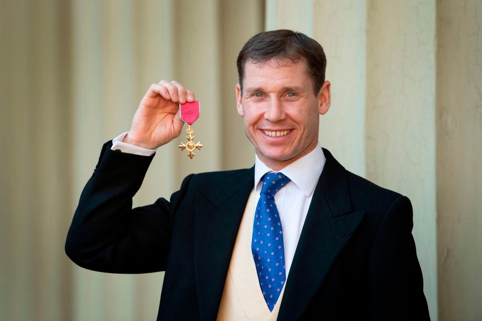  Johnson collected his OBE on Tuesday