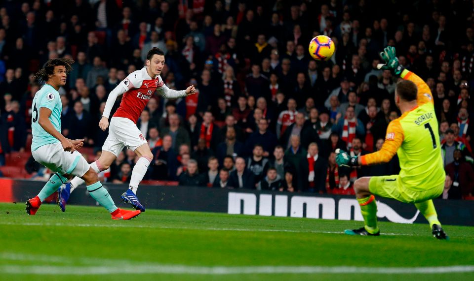  Arsenal ace Mesut Ozil opened the scoring at the Emirates after just four minutes